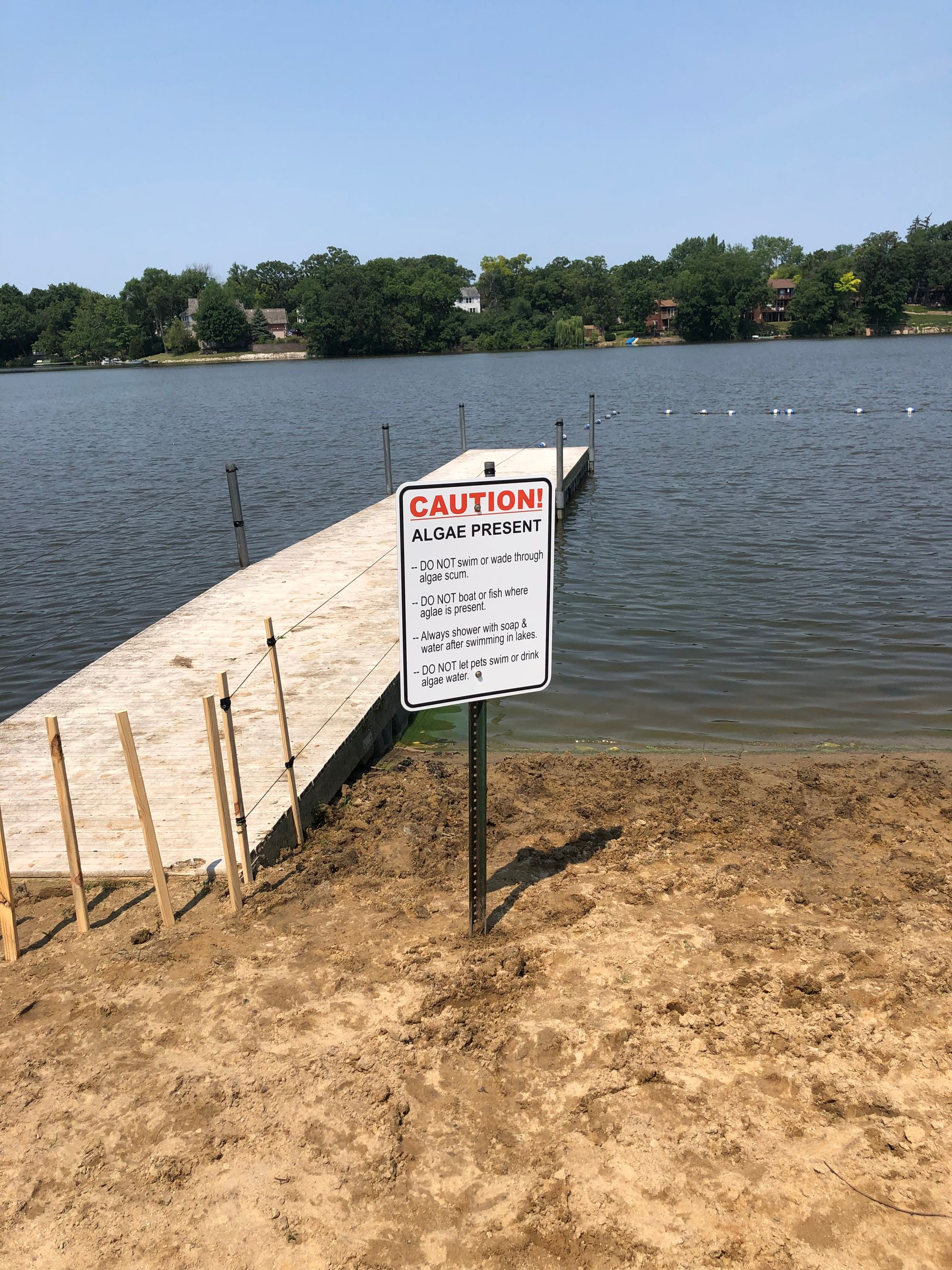 The swim area is clear of algae and the caution sign has been taken down.